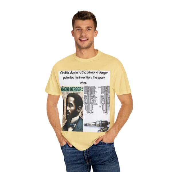 A man wearing a yellow t-shirt with a picture of a person.