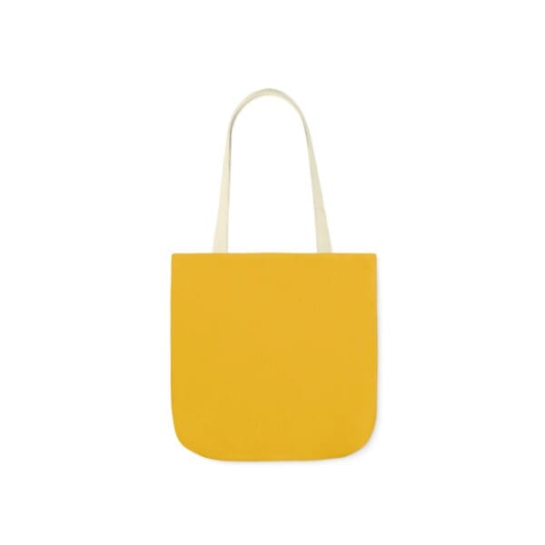 A yellow bag with white handles and a white handle.