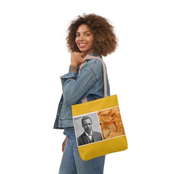 A woman holding onto a bag with an image of a man