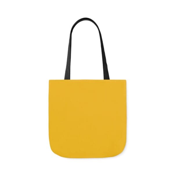 A yellow bag with black handles and a white background