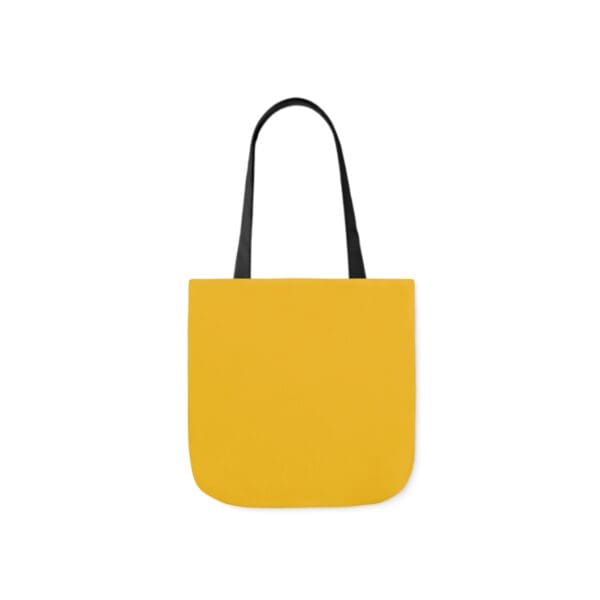 A yellow bag with black handles and a white background