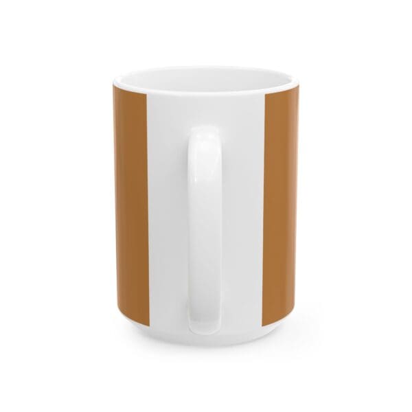 A white coffee mug with brown stripes on the bottom.